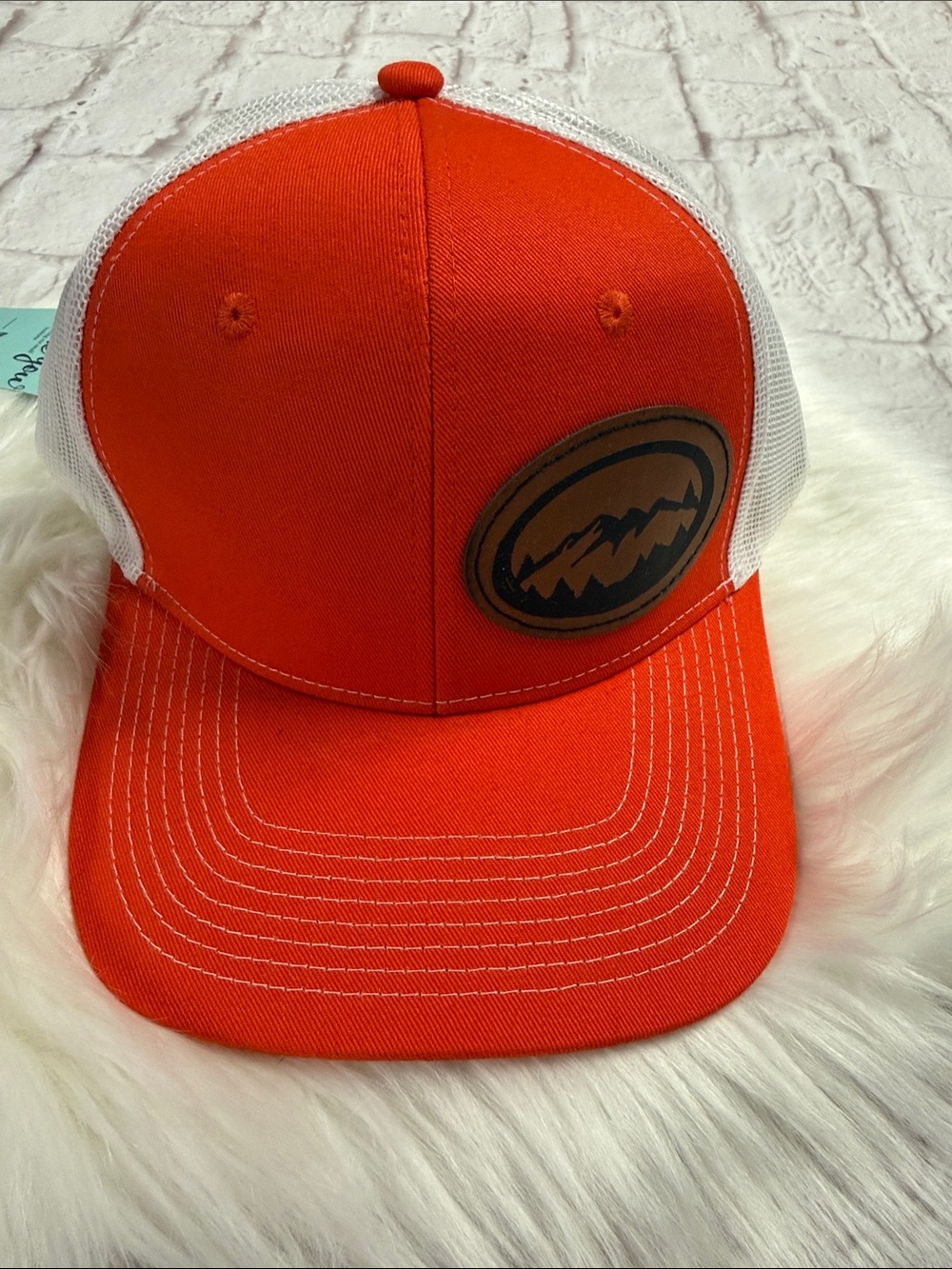 Unisex Orange and White Trucker Hat with Mountain Patch